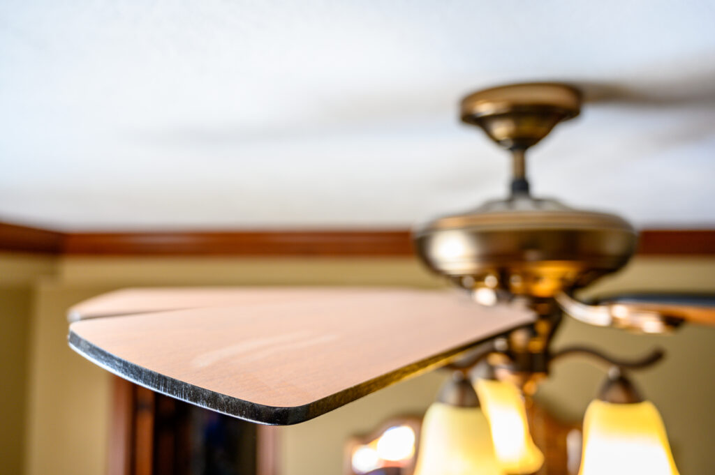 Close up image of a sealing fan with wooden blades